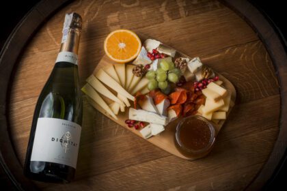 Board of Cheese with Additives and Champagne