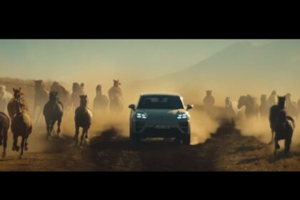 , dua Lipa W Porsche Macan Electric
