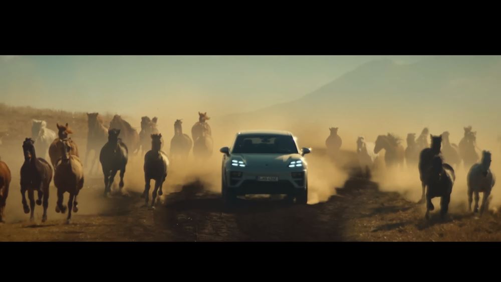 , dua Lipa W Porsche Macan Electric