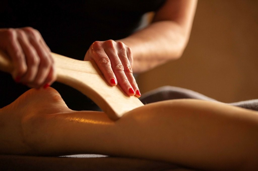 A maderotherapy session at the Manor House Hotel's holistic spa